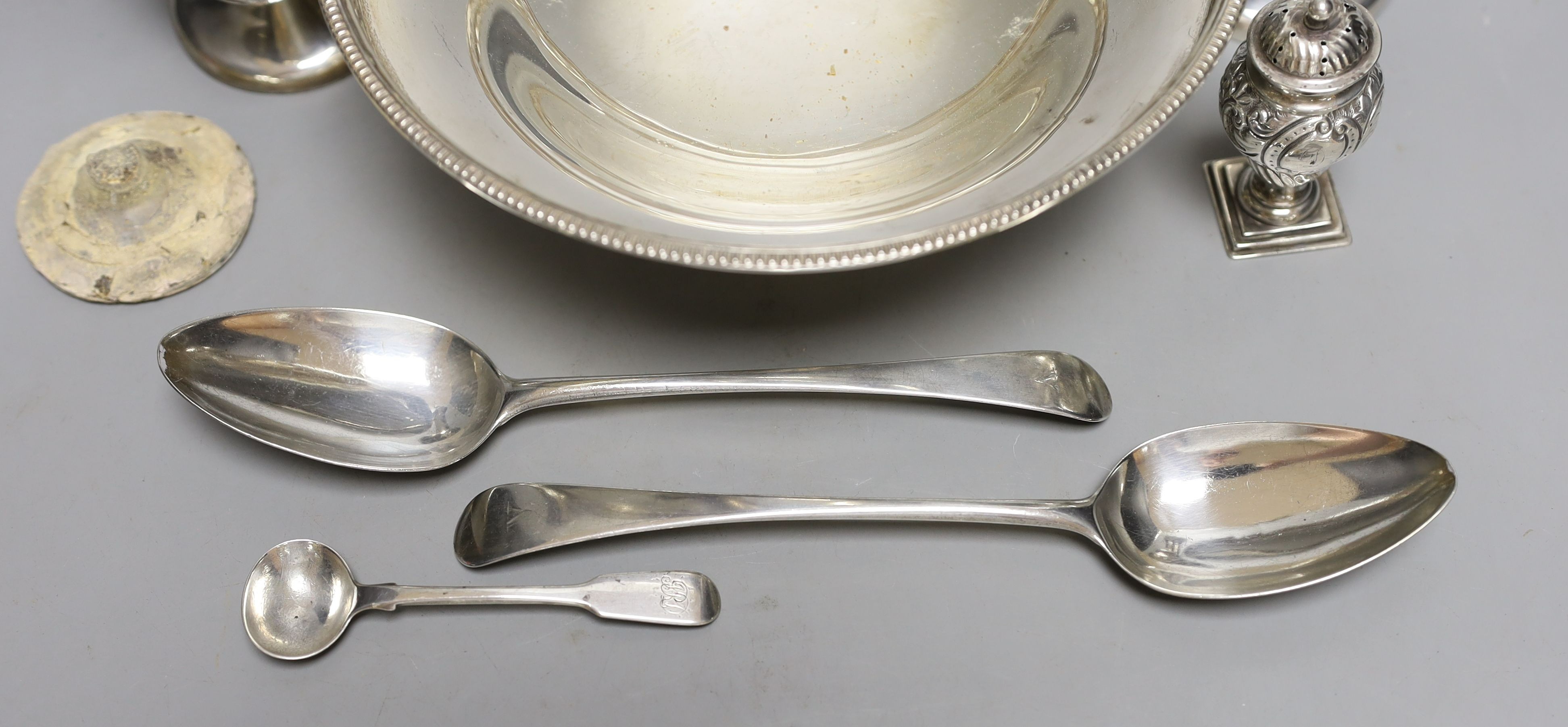 A George V silver bowl, by Walker & Hall, a pair of vases, pair of George III silver table spoons, one other spoon and a pepperette.